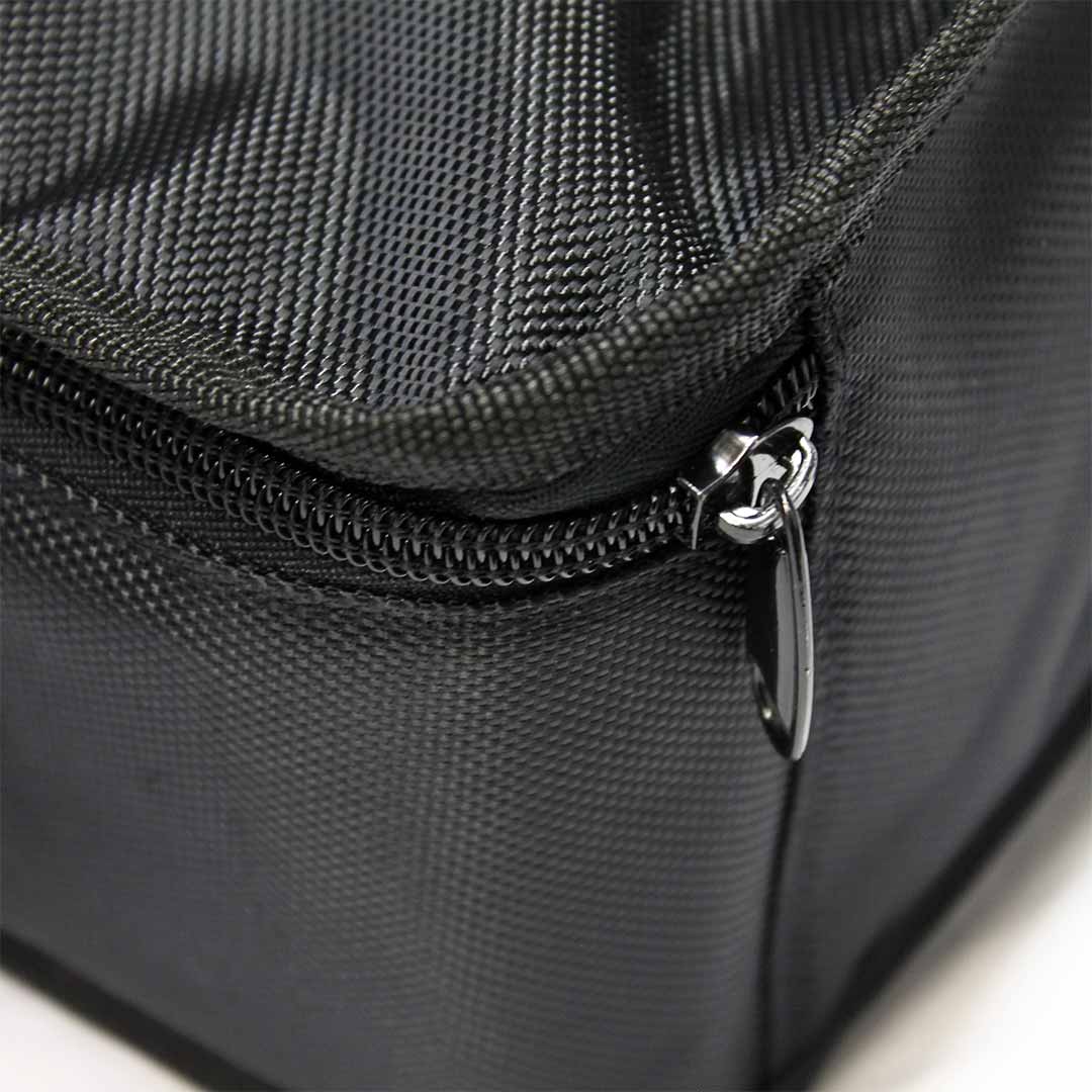 Reinforced corner seam with zipper on durable black nylon carry case