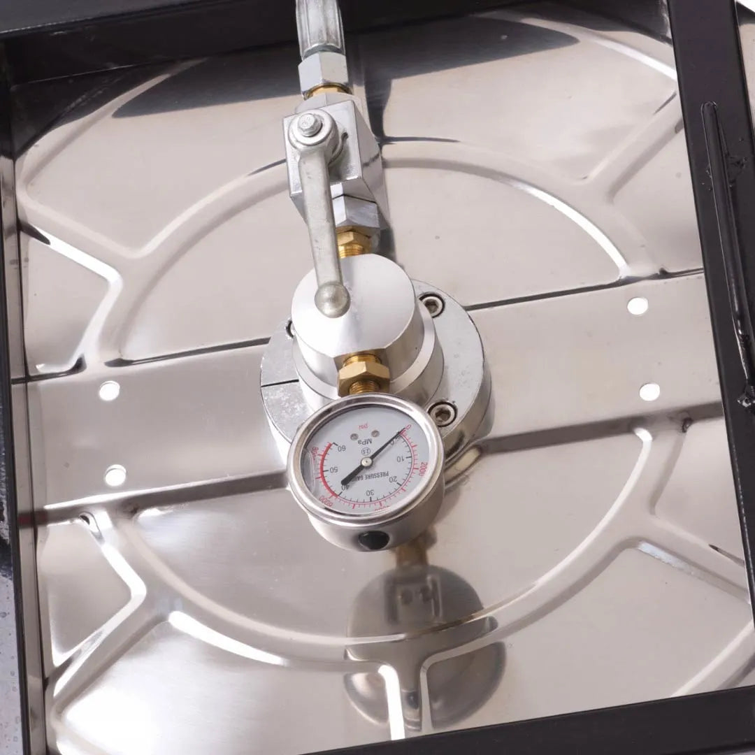 21" Stainless Steel Rotating Roof Cleaner for Pressure Washers, close-up of the central swivel valve and pressure gauge on the polished steel deck
