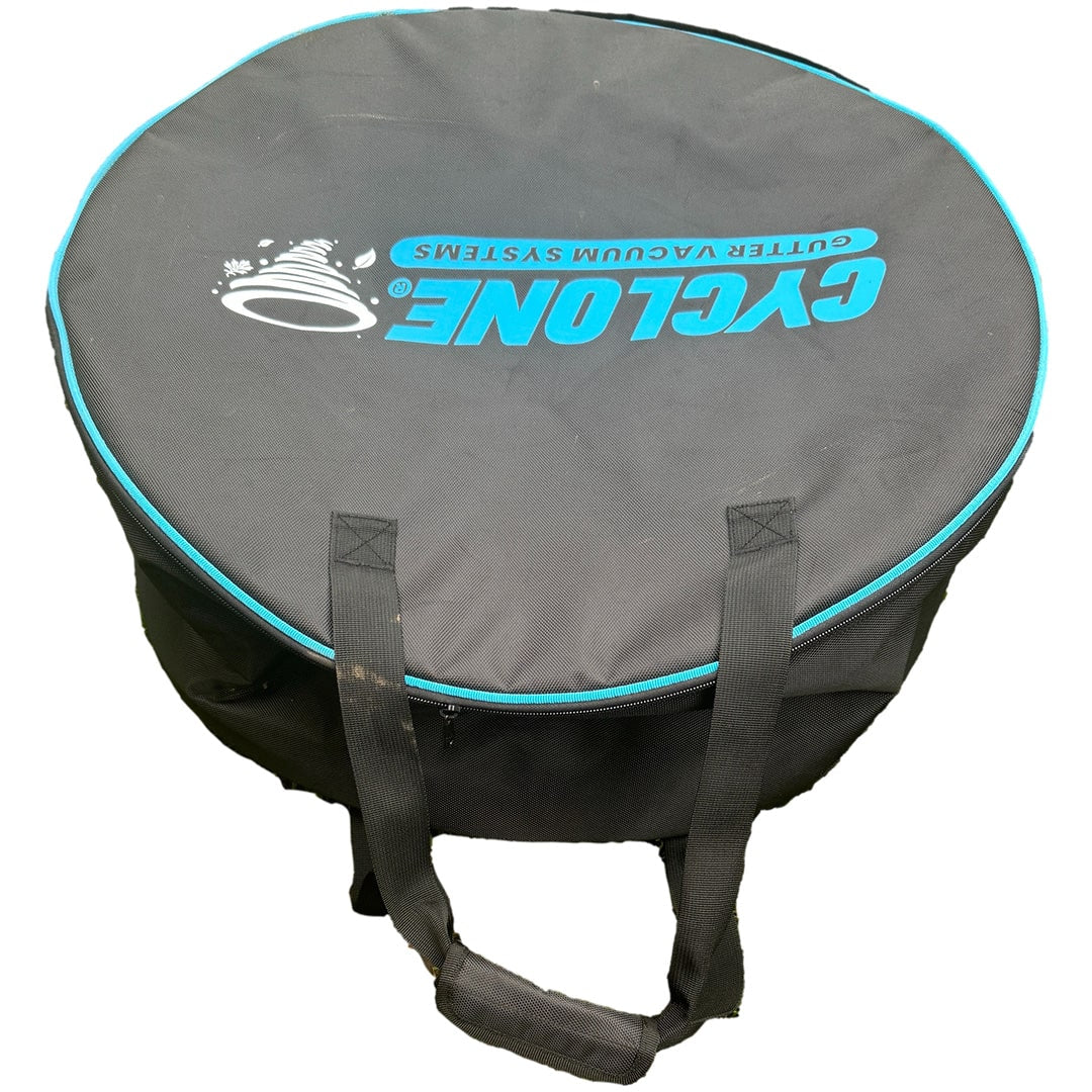 Top-down angled view of Cyclone gutter vacuum hose storage bag with zipper and reinforced carry handles