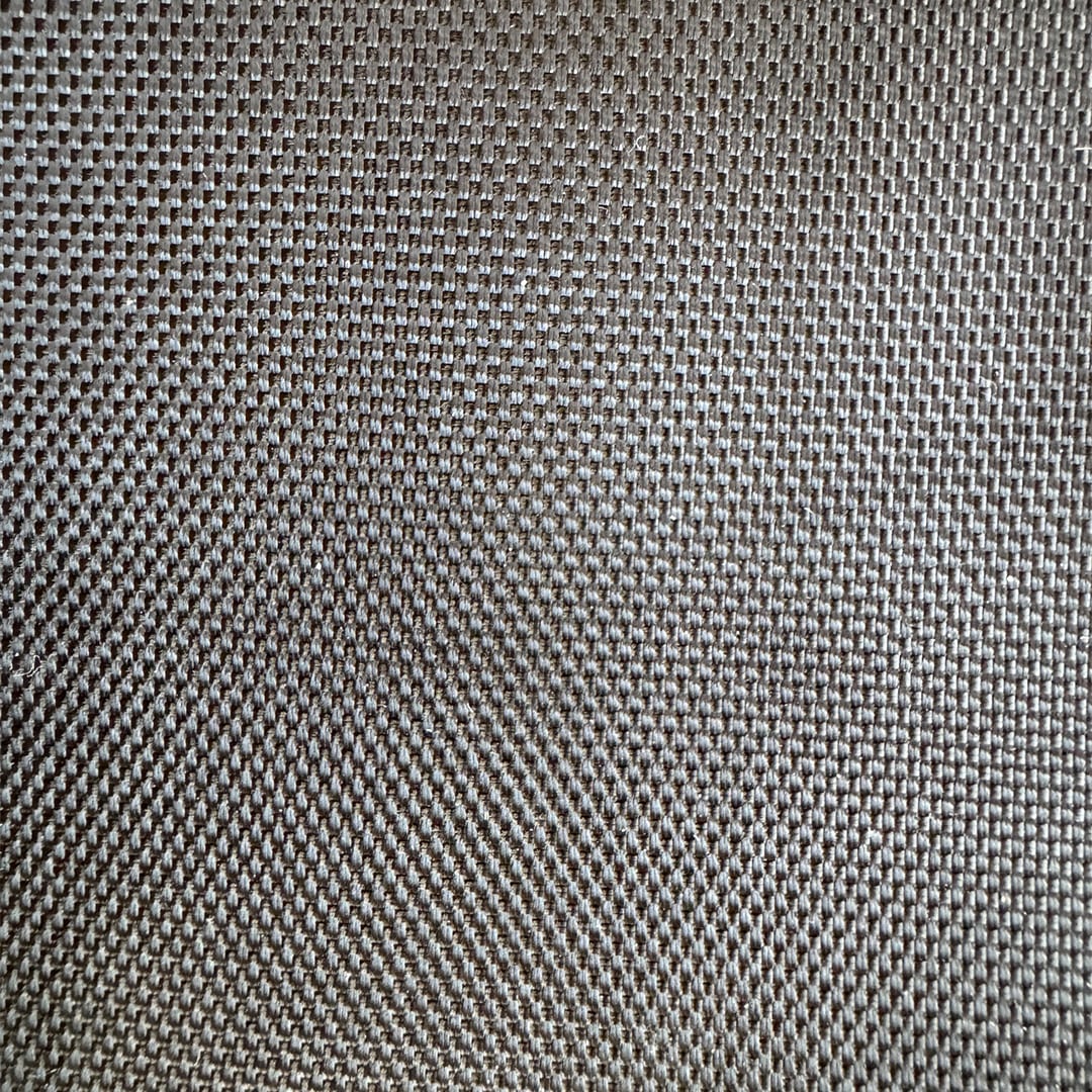 Close-up view of heavy-duty woven nylon fabric used in Cyclone vacuum hose storage bags