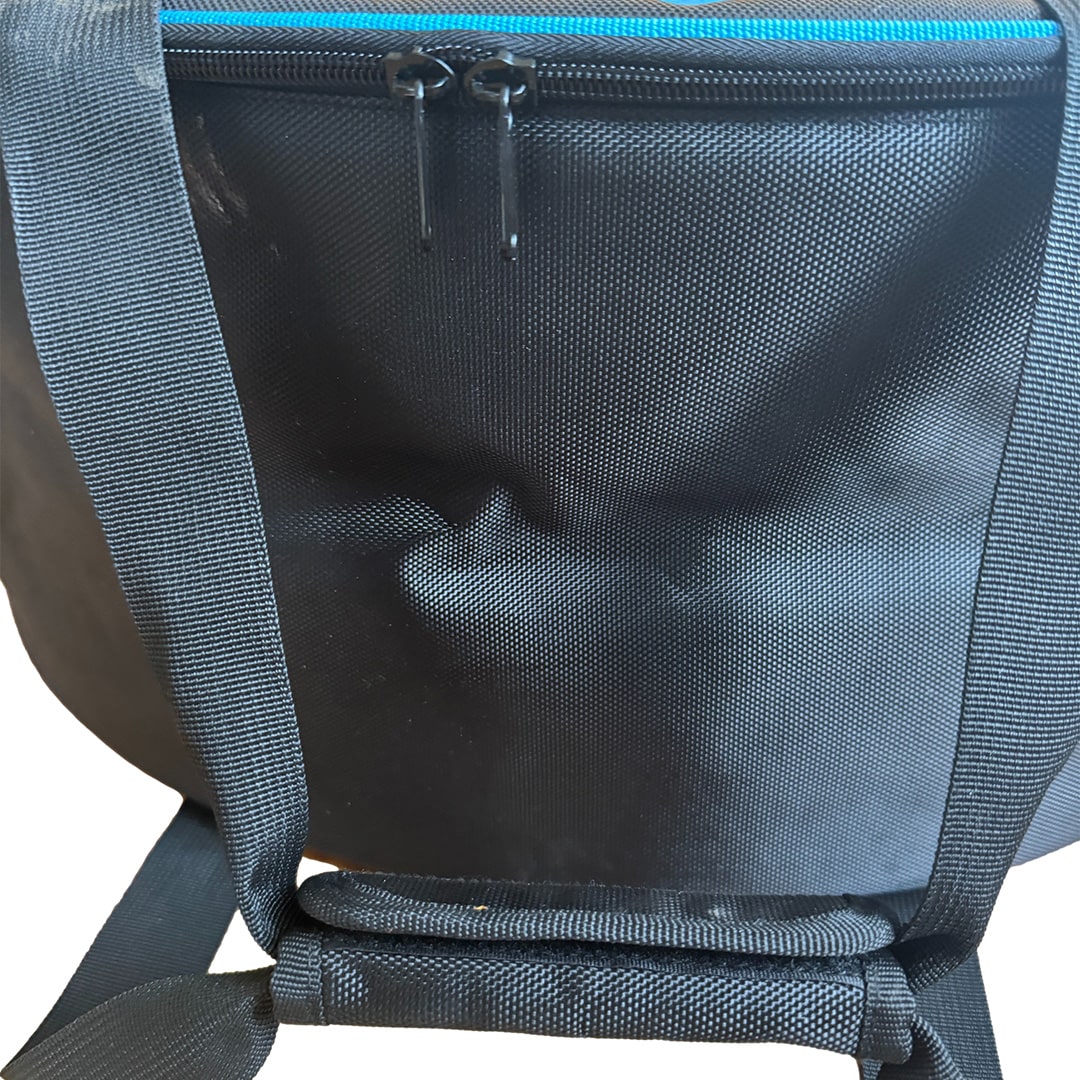 Close-up front view of Cyclone hose bag showing dual zipper, textured black surface, and carry straps