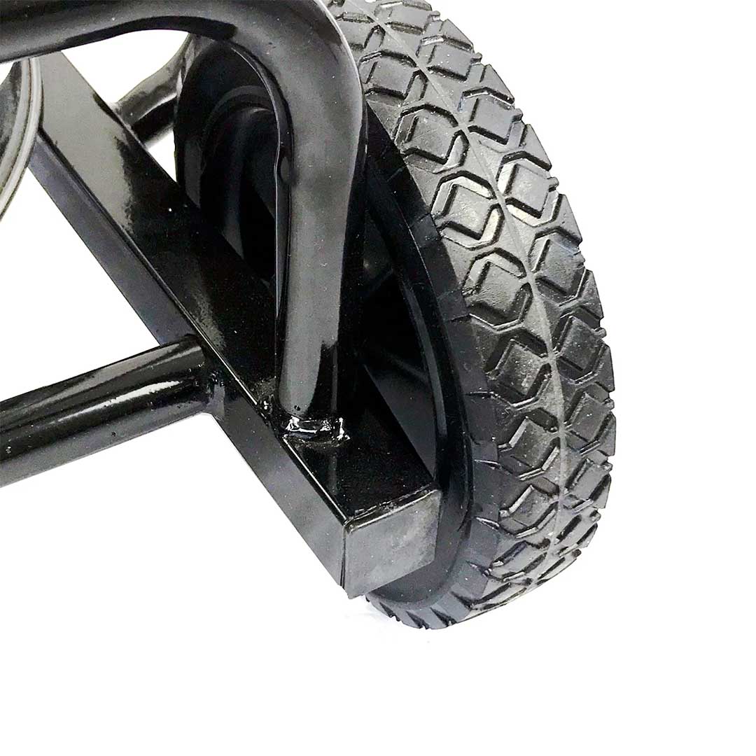 Close-up of GutterProVac all-terrain rear wheel with heavy-duty tread and sturdy frame attachment.